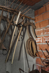 farm tools stored in a garage