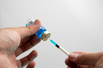 2019-ncov Covid-19 Corona Virus drug vaccine vials medicine bottles syringe injection. SARS-CoV-2 Vaccination, immunization, treatment to cure Covid 19 Corona Virus infection. Medical concept.