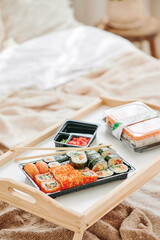 roll delivery. Japanese sushi food delivery concept. Healthy food background. Takeout meal.