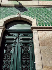 Green tiled facade in Lisbon, Portugal
