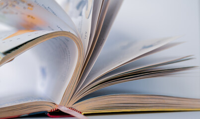 Open book pages isolated on white background