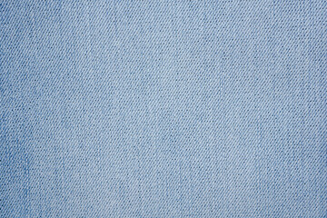 Denim blue jeans fabric. Denim background texture for design. Canvas denim. Blue jeans texture for any background.