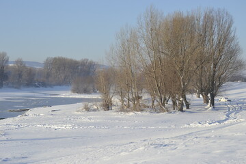 Fototapeta na wymiar Panorama of the frozen backwater, Danube in December 2012.