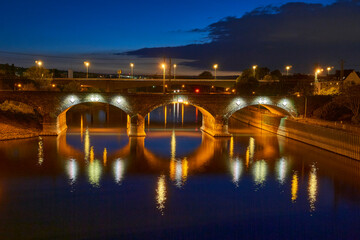Fototapeta na wymiar Balduin Brücke bridge at night in Koblenz, Germany