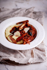 Brisket ragu with mushrooms and parmesan mash.style rustic.