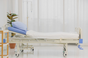 White and clean tone patient bed in hospital room