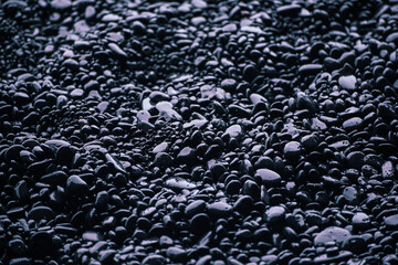Black pebbles background