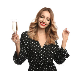 Happy young woman with glass of champagne on white background. Christmas celebration