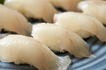 Fresh white fish sushi, Japanese food 