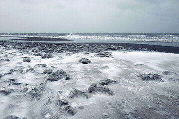 Winter in Holland with ice along the coast
