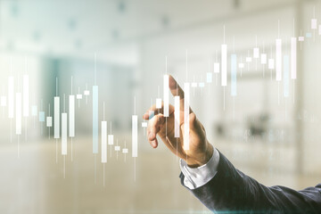 Multi exposure of trader hand clicks on virtual abstract financial graph interface on blurred...