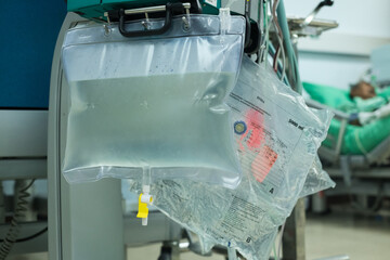 Dialysis machine is working. Acting as a substitute for the kidneys to drive waste from the body.