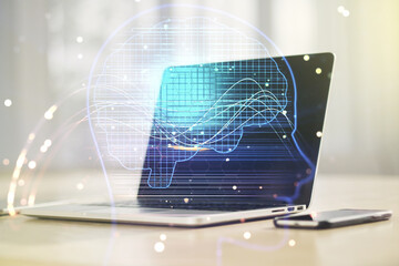 Double exposure of creative human head microcircuit with computer on background. Future technology and AI concept