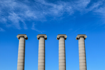 Four stone columns in Barcelona.