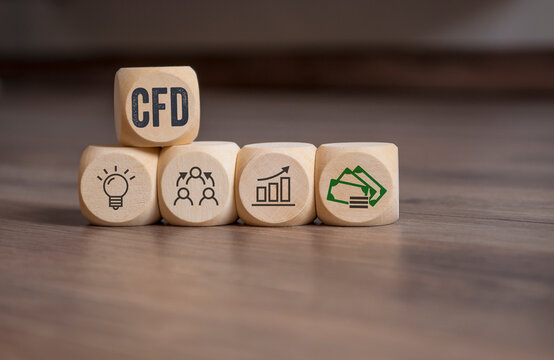 Cubes, dice or blocks with acronym CFD - Contracts For Difference on wooden background