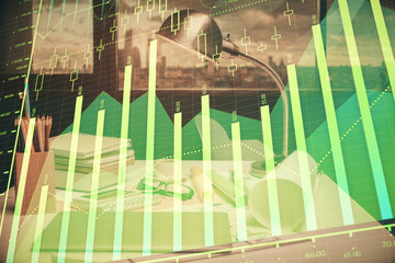 Double exposure of stock market graph drawing and office interior background. Concept of financial analysis.