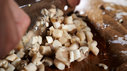 Cook chopped mushrooms on the board