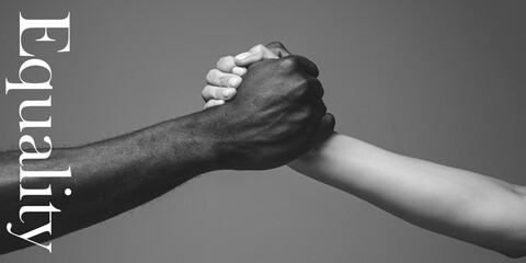 Support. African and caucasian hands gesturing on gray studio background. Tolerance and equality, unity, support, kindly coexistence together concept. Worldwide multiracial community. Flyer.