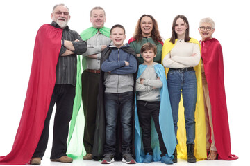 in full growth. happy family in superhero raincoats.