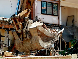 Closeup bucket of backhoe at construction site