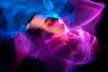 lightpainting portrait, new art direction, long exposure photo without photoshop, light drawing at long exposure. abstract portrait 	
