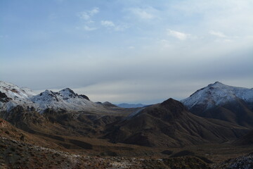 unpvaed road to the Red Passs at the Titus Canyon Road in the Amargosa Mountains, Death Valley National Park in winter with fresh snow