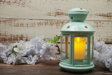 Blue Lantern decorative with candles with space copy on wooden background
