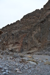 one person hiking in the titus canyon in the Death Valley National Park on a December day