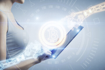 Double exposure of blockchain business sketch hologram and woman holding and using a mobile device.