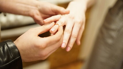 hands of the groom and bride