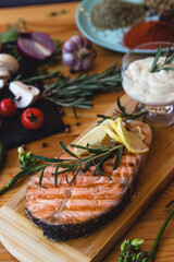 Salmon steak grilled with lemon