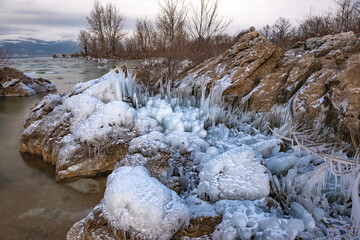 frozen rocks on the shores of the lake