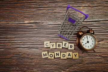 Cyber Monday message alphabet letter on wooden background