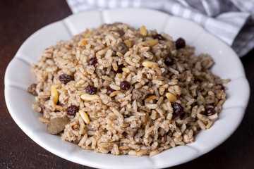 Traditional delicious Turkish food; rice pilaf with pine nuts and currants (Turkish name; ic pilav or pilaf)