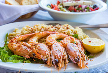Grilled tiger shrimps with spice and lemon. Grilled seafood.