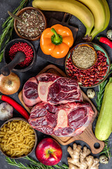  Set of different products for a healthy diet - meat, cereals, vegetables and fruits top view