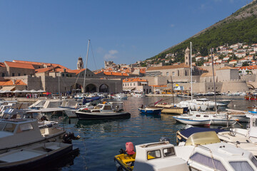 Fototapeta na wymiar View of the Old Port of the Old Town of Dubrovnik on a sunny day. Croatia
