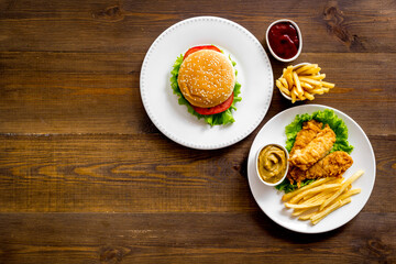 Overhead view of fast food - burger and french fries, flat lay