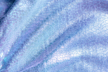 Piece of metal yarn knitted fabric texture with soft draped