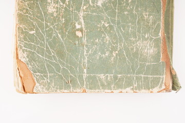 old green book on white background