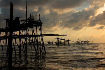 silhouette of thai fisherman tools