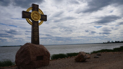 cross on the beach of lake Nero Russia