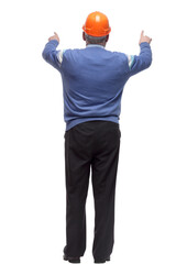 architect in a protective helmet is pointing at a large white screen