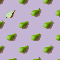 green pears on a light lilac background. pattern