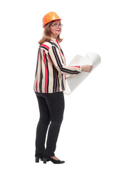 rear view. adult female architect reading a new drawing