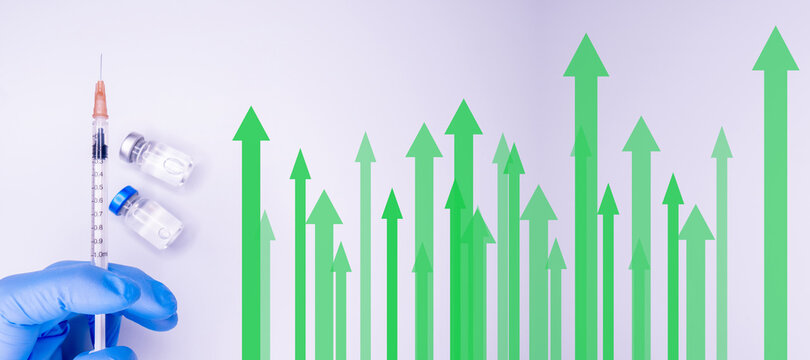 Financial and economic crisis recover from COVID-19 collapse with Coronavirus vaccine discovery concept, businessman investor  syringe pointing up on growth profit financial bar graph. - Powered by Adobe