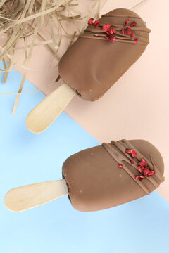 Potato dessert on a stik. Cake chocolate background
