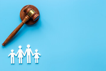 Family figure with judge gavel. Family law concept