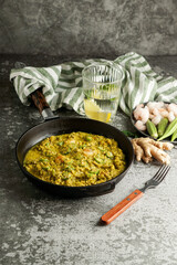 Caruru, traditional Afro-Brazilian dish made with okra and dried shrimp, tomatoes., cashews and peanuts