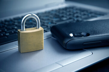 Cyberspace Security, Lock on Top of a Laptop Blue Toned